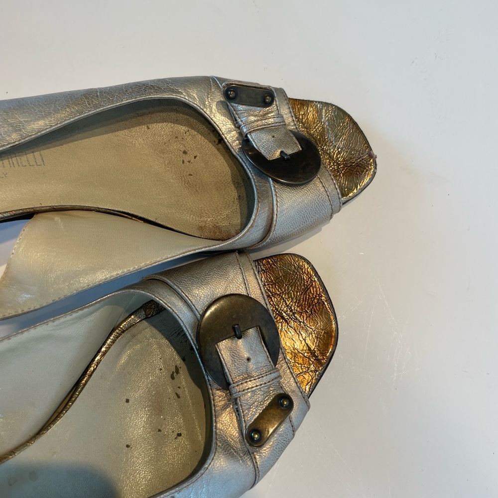 Renzo Fontanelli gold open toe shoes.